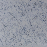 blue veining on top of a creamy quartz background