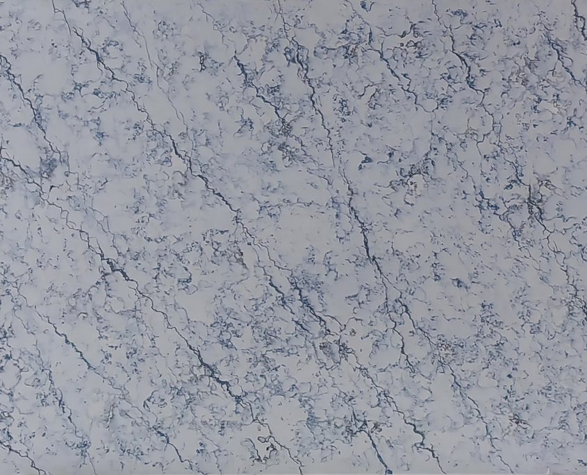 blue veining on top of a creamy quartz background